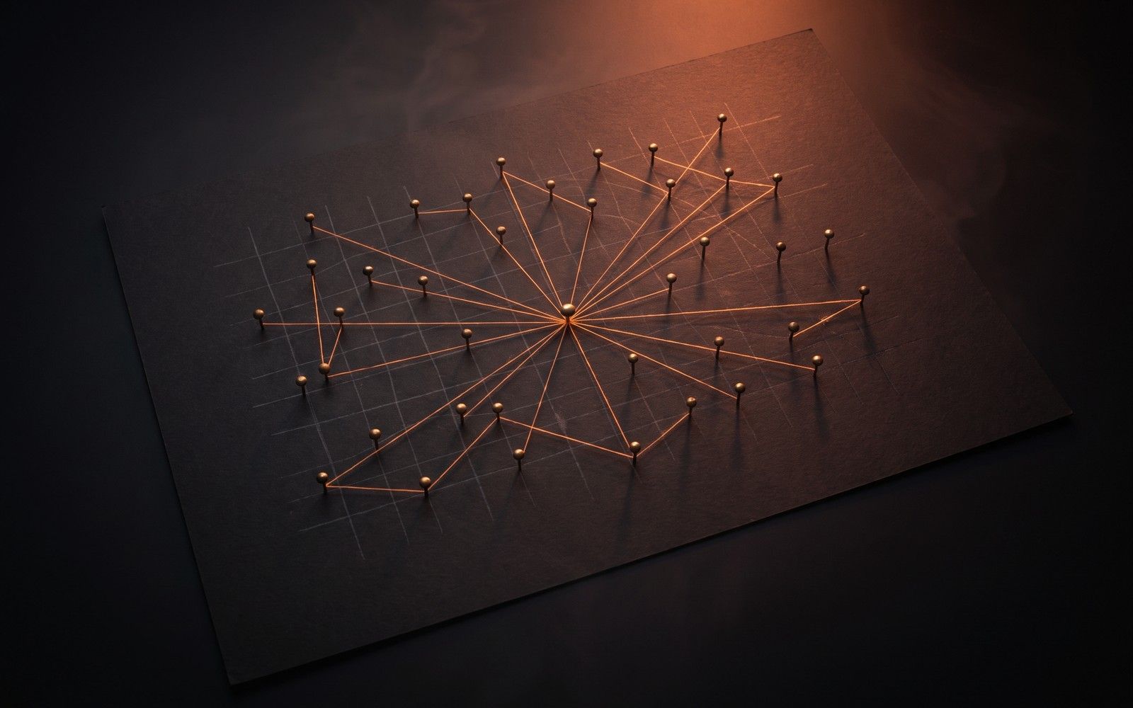 Brass pins on a dark street map, joined by glowing orange threads that radiate from one central pin